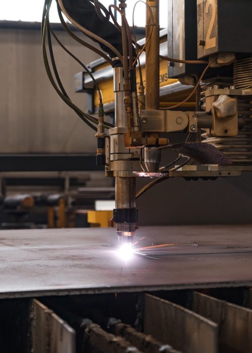 A closeup shot of metal plasma cutting in a factory